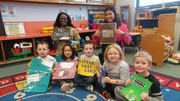 group of 3 to five year olds with high school students