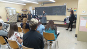 Meghann Miller addresses potential Cosmetology Students as Ms. Hernandez and Ms. Born look on.