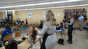 KACC Cosmetology Students demo hair styling.