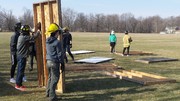 Fire-Rescue-EMS Students helping to erect room.