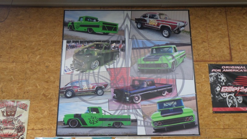 Poster hanging in the Shop with a bunch of specialty cars.