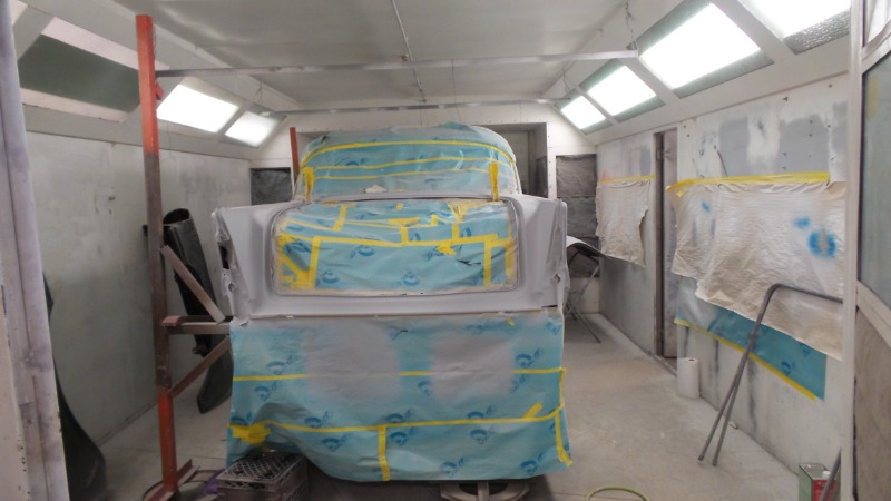 Collision Repair Paint Booth Interior with 1957 Chevy parked inside.  Chevy Not included for bid process.