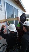 KACC Construction Students Installing a Window