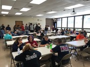 Student Volunteers and their instructors sharing a lunch break.