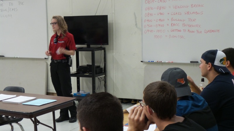 Amelia speaking with students.