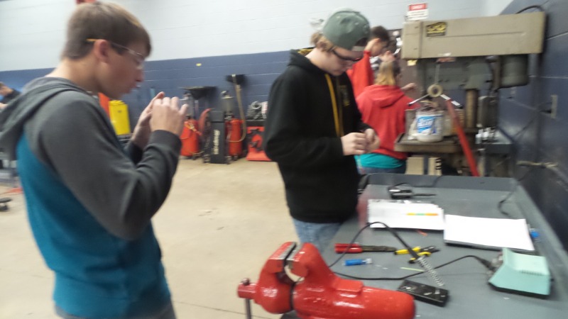Section 1 Students undergoing basic automotive electrical theory testing.
