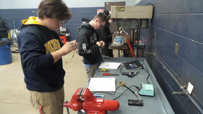 Section 2 Students undergoing basic automotive electrical theory testing.