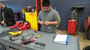 Section 1 Students undergoing basic automotive electrical theory testing.