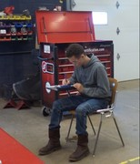 Section 2 Students undergoing basic automotive electrical theory testing.