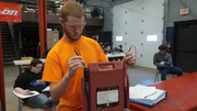 Section 2 Students undergoing basic automotive electrical theory testing.
