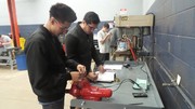 Section 3 Students undergoing basic automotive electrical theory testing.