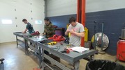 Section 3 Students undergoing basic automotive electrical theory testing.