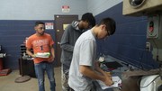 Section 3 Students undergoing basic automotive electrical theory testing.