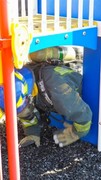 Fire-Rescue-EMR students undergoing SCBA training on the preschool lab playground.