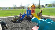 Fire-Rescue-EMR students undergoing SCBA training on the preschool lab playground.