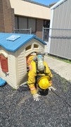 Fire-Rescue-EMR students undergoing SCBA training on the preschool lab playground.