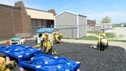 Fire-Rescue-EMR students undergoing SCBA training on the preschool lab playground.