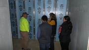 Pic of Mr. Umphrey, Rep Parkhurst and staff inside safe room