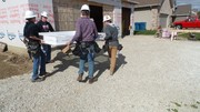 Students Carrying Window to be installed today.