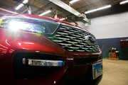 Front grill of car with Ford Logo