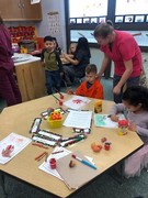 Making hand turkeys in art.