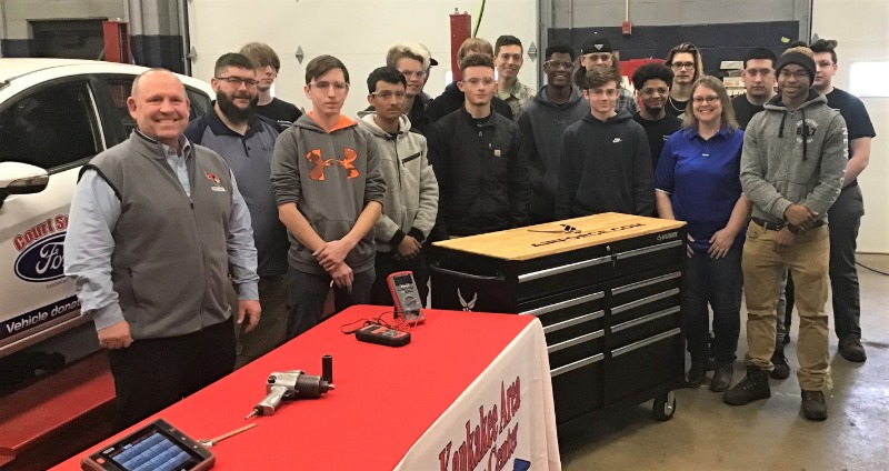 Auto Tech Students with Mr. Guerin and Technical Sergeant Chavanu from the US Army Recruiting office.