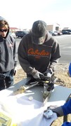 Picture of KACC Student utilizing Jaws of Life to pick up an Egg