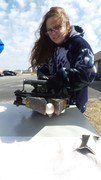 Picture of KACC Student utilizing Jaws of Life to pick up an egg.