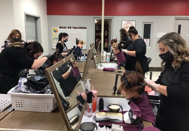 Cosmetology Students taking day 1 of their 2 day practical exam.