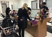 Cosmetology Students taking day 1 of the 2-day practical exam.
