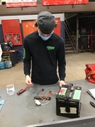 Picture of Nate Bigson working on circuitry.