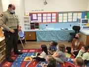 Deputy Powell speaking to preschoolers